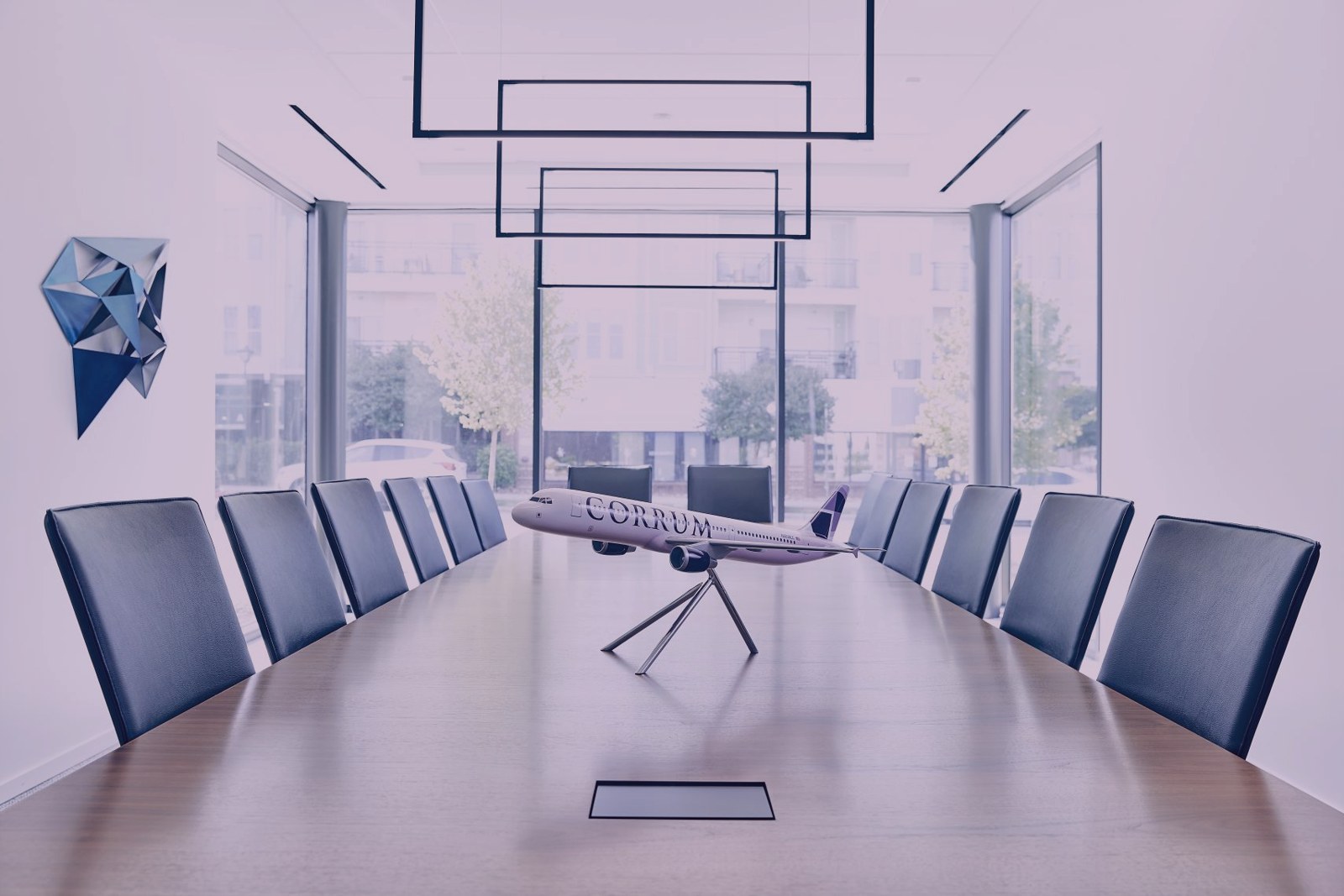 A Corrum-branded aircraft model on the boardroom table at Corrum's Charlotte office.